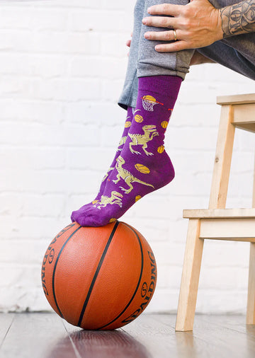 Men's Dino Basketball Socks - Purple men's basketball socks with yellow dinosaur and basketball patterns, unique handmade Canadian gift.