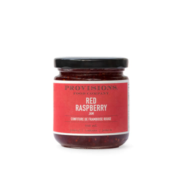 Raspberry Jam - Handmade Canadian red raspberry jam in a gift-ready glass jar with red label.