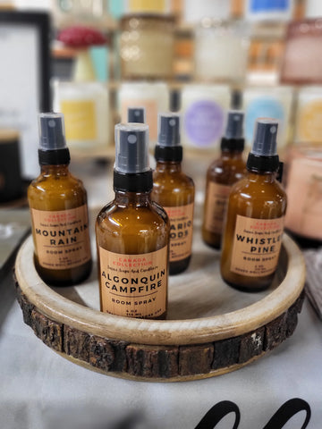 Room Sprays: Canada Collection (Sara's Soaps and Candles) - Handmade Canadian room sprays in amber bottles with black sprayers, unique gift set on rustic wood tray.