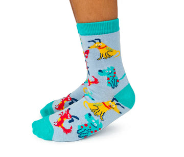 Kids Silly Dogs Socks - Light blue kids socks with colorful playful dog patterns, handmade Canadian gift by Uptown Sox.