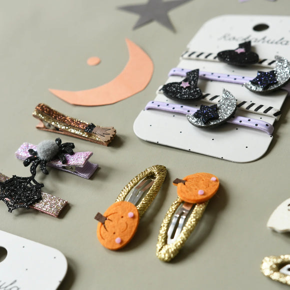 Little Pumpkin Bag - Two glittery gold hair clips with small orange felt pumpkins attached, festive Halloween kids accessories.