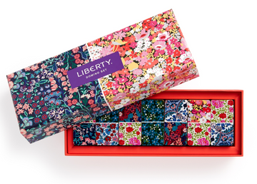 Liberty Floral Wood Domino Set - Handmade Canadian wooden domino set with vibrant Liberty floral designs in a colorful gift box.