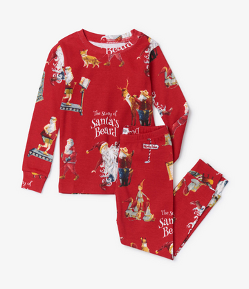 The Story Of Santa's Beard Book and Pajama Set - Red cotton long-sleeve kids pajama set featuring Santa, reindeer, and "The Story of Santa’s Beard" text designs.