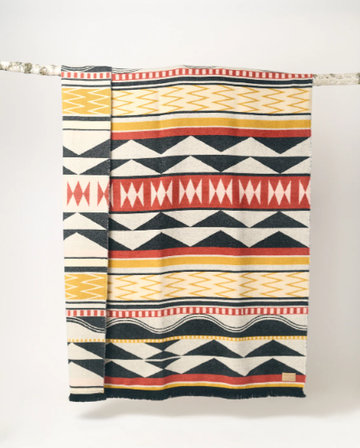 Mini Tipi Reversible Blanket (Indigenous Designed) - various patterns - Handmade Canadian reversible blanket with bold geometric Indigenous patterns in red, black, yellow, and cream, unique gift.