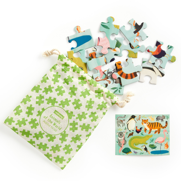 Animals Of The World Puzzle to Go - Handmade Canadian Animals Of The World Puzzle to Go with colorful animal pieces in a green patterned drawstring bag, unique.