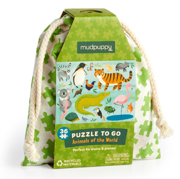 Animals Of The World Puzzle to Go - Animal-themed wooden puzzle pieces in a green drawstring bag, unique handmade Canadian gift.