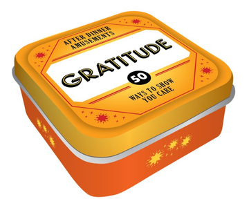 After Dinner Amusements: Gratitude - Square orange tin with yellow lid, labeled "Gratitude" containing 50 unique handmade Canadian gifts ideas.