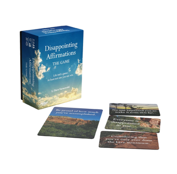 Disappointing Affirmations: The Game - Disappointing Affirmations card game with blue sky box and colorful affirmation cards, unique handmade Canadian gift.