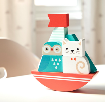 Owl & the Pussy-Cat Wooden Stacking Toy - Handmade Canadian wooden stacking toy featuring an owl and cat on a red boat, unique gift.