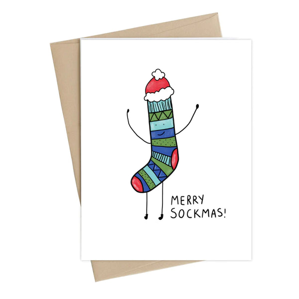 A white card on top of a brown envelope. On the card there is a blue, green and red illustrated smiling sock wearing a Santa hat. Next to the sock reads 