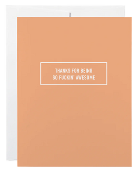 A coral card with white text in the middle reading, "Thanks for being so fuckin' awesome"