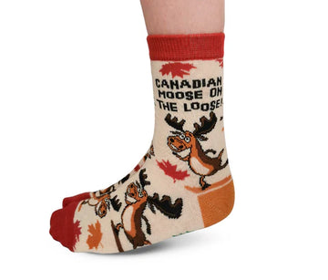 Kids Canadian Moose Socks - Kids handmade Canadian Moose socks with playful moose design, red accents, and autumn leaves, unique gift idea.