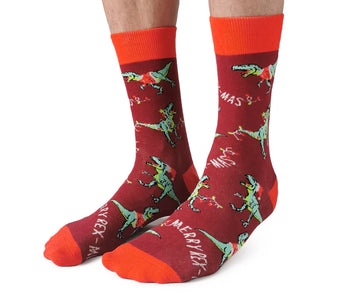 Men's Merry Rex-Mas Socks - Red crew socks with green dinosaur wearing Santa hat and "Merry Rex-Mas" text, unique handmade Canadian gift.