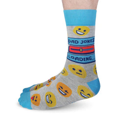 Men's Dad Jokes Socks - Gray crew socks with light blue toes and cuffs, featuring yellow smiley faces and "Dad Jokes Loading" text, unique handmade.
