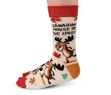 Women's Canadian Moose Socks - Handmade Canadian Moose socks in cream with red and orange accents, featuring a unique moose and maple leaf design, perfect.