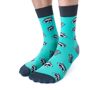 Men's Raccoon Bandit Socks - Turquoise socks with dark blue toes and cuffs featuring playful raccoon faces and trash cans pattern.