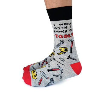 Men's Tool Time Socks - Gray men's socks with black cuff, red heel and toe, featuring colorful tool illustrations and "I work with a bunch of tools" .