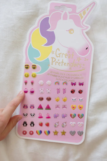 Unicorn Sticker Earrings - Colorful unicorn-shaped card displaying a set of small, unique, handmade Canadian children's sticker earrings in various.