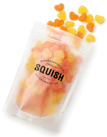 Vegan Sour Peach Hearts (Squish) - Clear resealable bag of handmade Canadian vegan sour peach heart gummies in orange and yellow colors, unique gift idea.