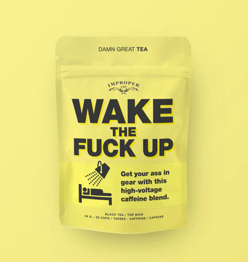 Wake the Fuck Up Tea - Bright yellow handmade tea pouch with bold black text Wake the Fuck Up, unique Canadian gift.