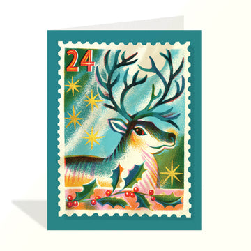 Holly Reindeer Card - Handmade Canadian Holly Reindeer Christmas card with vibrant teal background and festive stars, unique gift design.