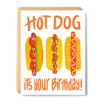 Hot Dog It's Your Birthday - Handmade Canadian birthday card with three colorful hot dogs and playful orange text, unique gift design.
