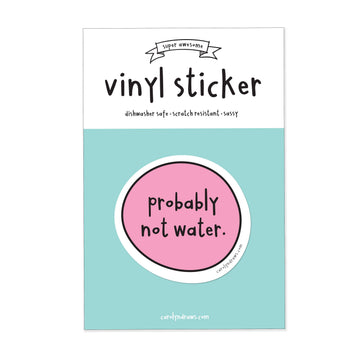 Probably Not Water Vinyl Sticker - Round pink vinyl sticker with black text "probably not water" on white backing card with teal bottom section.