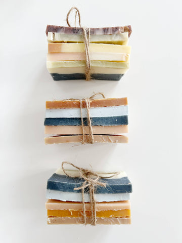 Soap Sample Stack - Three bundles of handmade Canadian soap bars in neutral, earthy tones, tied with natural twine for a unique gift.