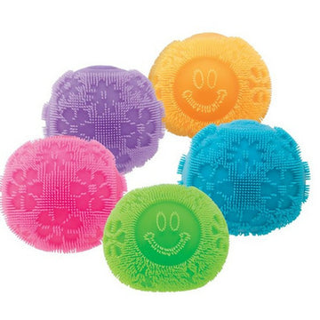 NeeDoh Fuzz Ball Flower Power - Colorful handmade NeeDoh Fuzz Ball Flower Power toys in pink, purple, orange, blue, and green, unique Canadian gift for kids.