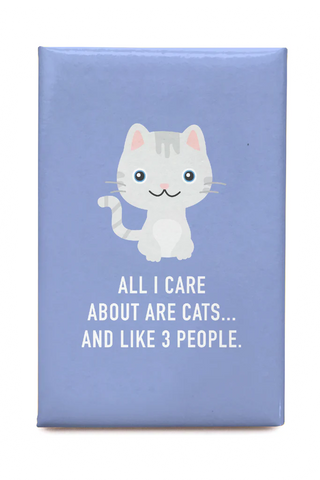 A purple magnet with a cat and the phrase “All I Care About Are Cats… And Like 3 People.”