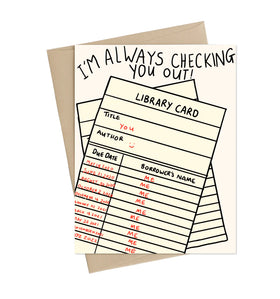 A greeting card with an illustration of a library card with the text "I'm always checking you out!"