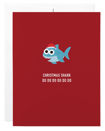Christmas Shark Card - Red Christmas card with a cute blue shark wearing a Santa hat and text "Christmas Shark Do Do Do Do Do Do Do" unique.