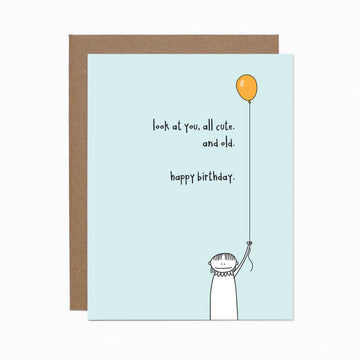 Cute + Old Birthday Card - Handmade Canadian birthday card with a cute, old-style cartoon and orange balloon design, unique gift idea.