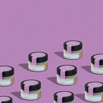 Earl Grey Honey (Chandler Honey) - Small glass jars of Canadian Earl Grey Honey with black lids and purple labels, handmade gourmet gift.