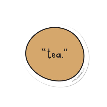 "Tea." Vinyl Sticker - Round tan vinyl sticker with black handwritten text "tea." in a casual font, unique Canadian handmade gift accessory.