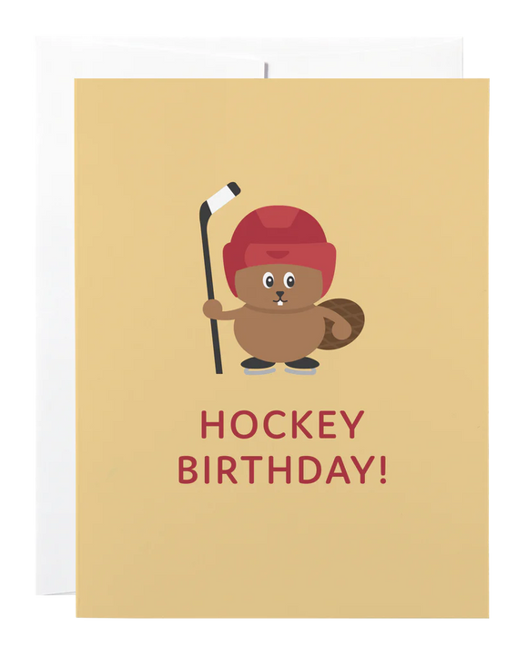 A brown card with a beaver in a hockey helmet and skates holding a hockey stick and the words "Hockey Birthday!"