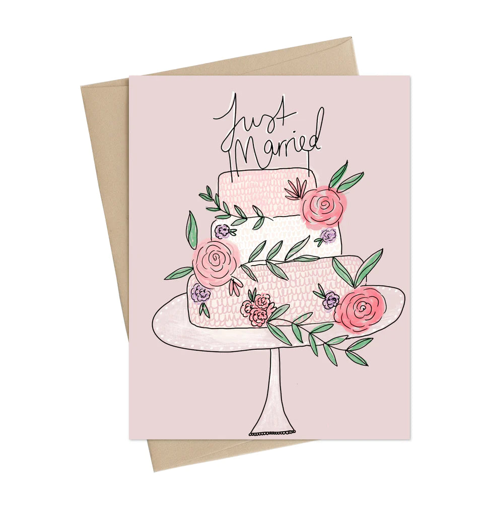 A pink card with an illustrated pink wedding cake with roses on a cake stand. The cake topper reads "Just Married"