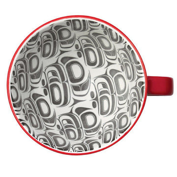 Porcelain Art Mug - Transforming Eagle - Porcelain mug with intricate black and white Indigenous eagle design inside, handmade Canadian gift with red rim and handle.