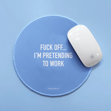 Pretending to Work Mousepad - Round blue mousepad with white bold text "Fuck off... I'm pretending to work," handmade Canadian gift with cheeky design.