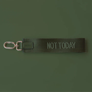 Not Today Wristlet - Olive green fabric wristlet with silver clasp and "NOT TODAY" text embroidered in matching green thread.