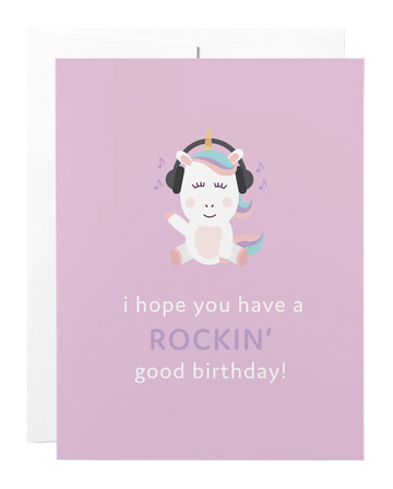 Rockin' Birthday Card - Handmade Canadian birthday card with a smiling unicorn wearing headphones on a pink background, unique gift design.