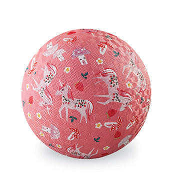 A pink ball with unicorns, daisies, strawberries and mushrooms