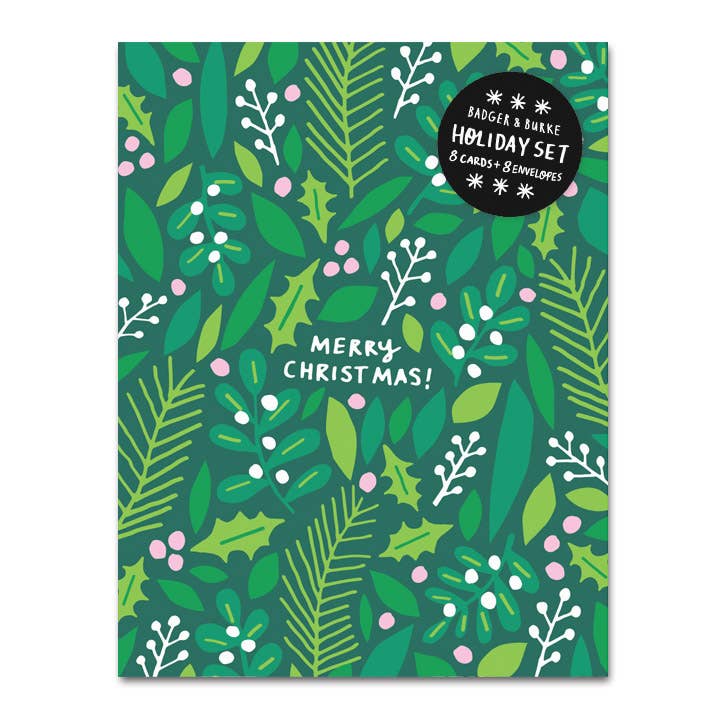 A green card with mistletoe and holly card patterns with the words "Merry Christmas"