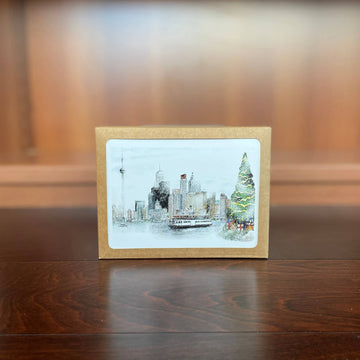 Winter Skyline Christmas Card Box Set - Handmade Canadian Christmas card box set featuring unique winter skyline and festive tree illustration, ideal gift.