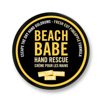 Beach Babe Hand Rescue (4oz) - Round black tin of Beach Babe Hand Rescue cream with bold yellow text, unique Canadian handmade gift.