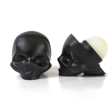 Black Skull Lip Balm- Scent: Vanilla - Black skull-shaped lip balm with vanilla scent, unique handmade Canadian gift.
