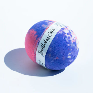 A pink and lavender colored bath bomb