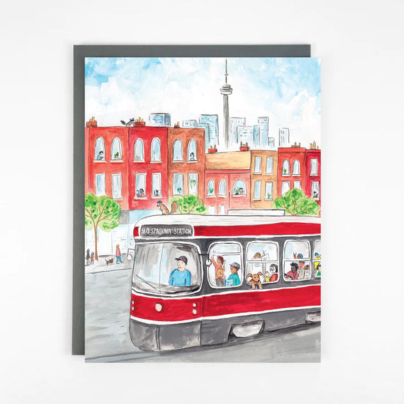 An illustration of the 510 Spadina streetcar with the CN Tower in the background