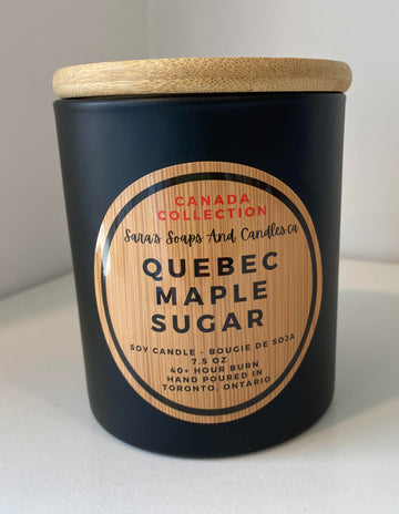 Quebec Maple Sugar Wood Wick Candle - Black matte glass candle with wooden lid and round label reading Quebec Maple Sugar Canadian handmade gift.