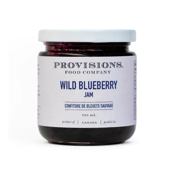Wild Blueberry Jam - Handmade Wild Blueberry Jam in clear glass jar with white label from Canadian Provisions Food Company, unique gift item.
